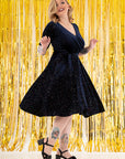 Luxe marineblauwe glinsterende swingjurk