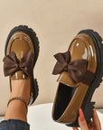 Chique, zoete platform loafers met strik